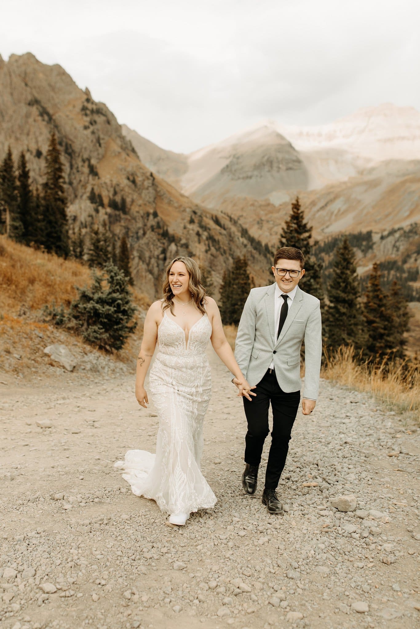bride and groom first look on top of mountain in ouray