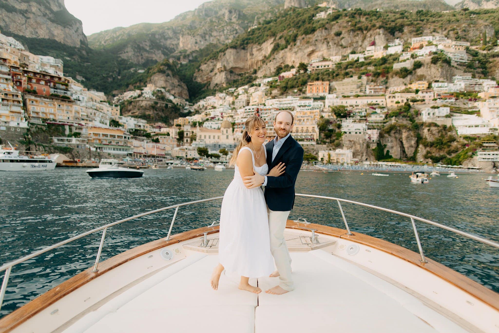 Engagement session boat cruise overlooking Positano at sunset