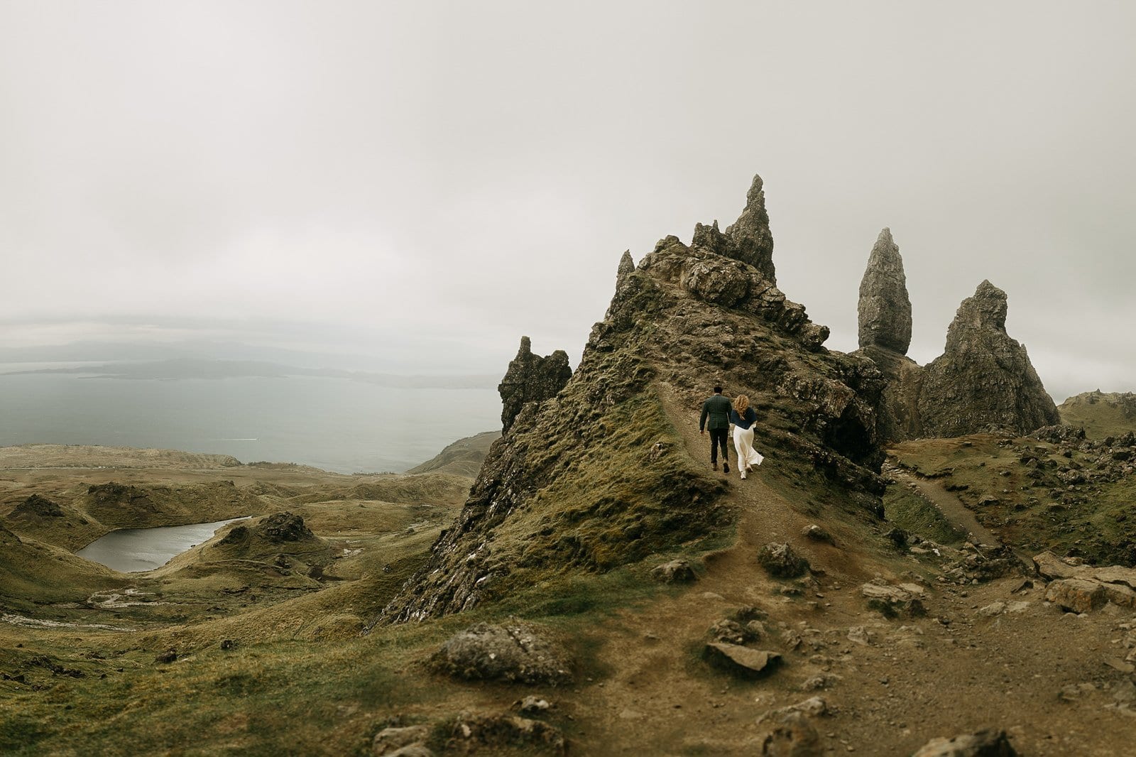 Couple hiking the Old Man of Storr for their elopement, Isle of Skye