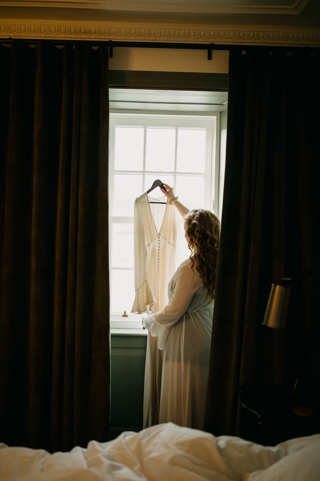 Bride with her vintage wedding dress at Monkstadt 1745 elopement, Isle of Skye