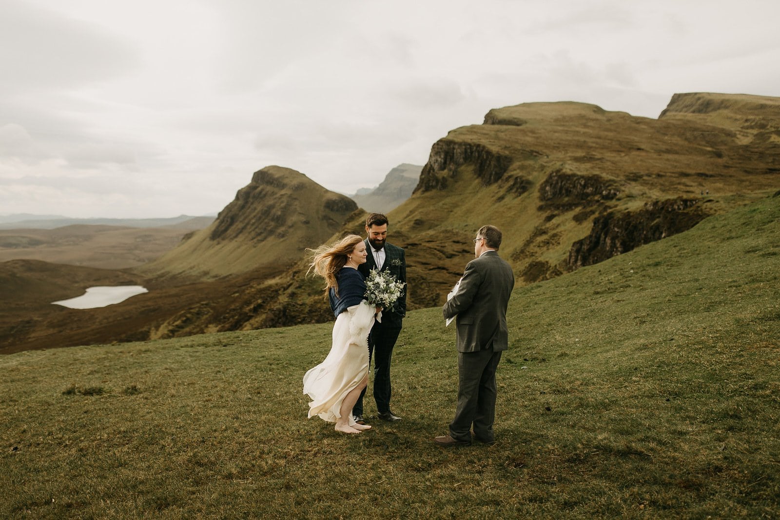 Couple exchanging vows at Quiraing, Isle of Skye elopement