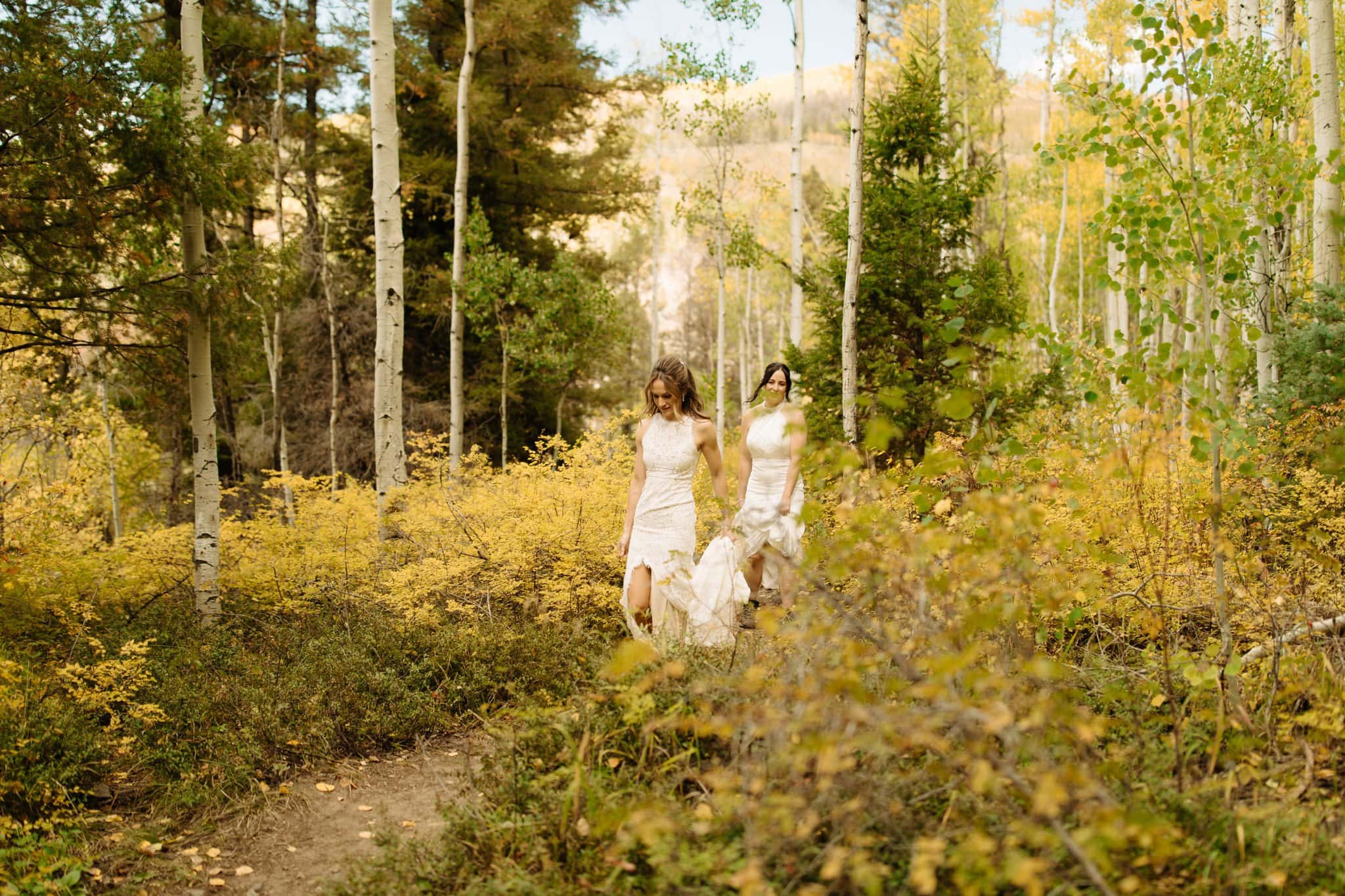same sex hiking elopement to waterfall in telluride