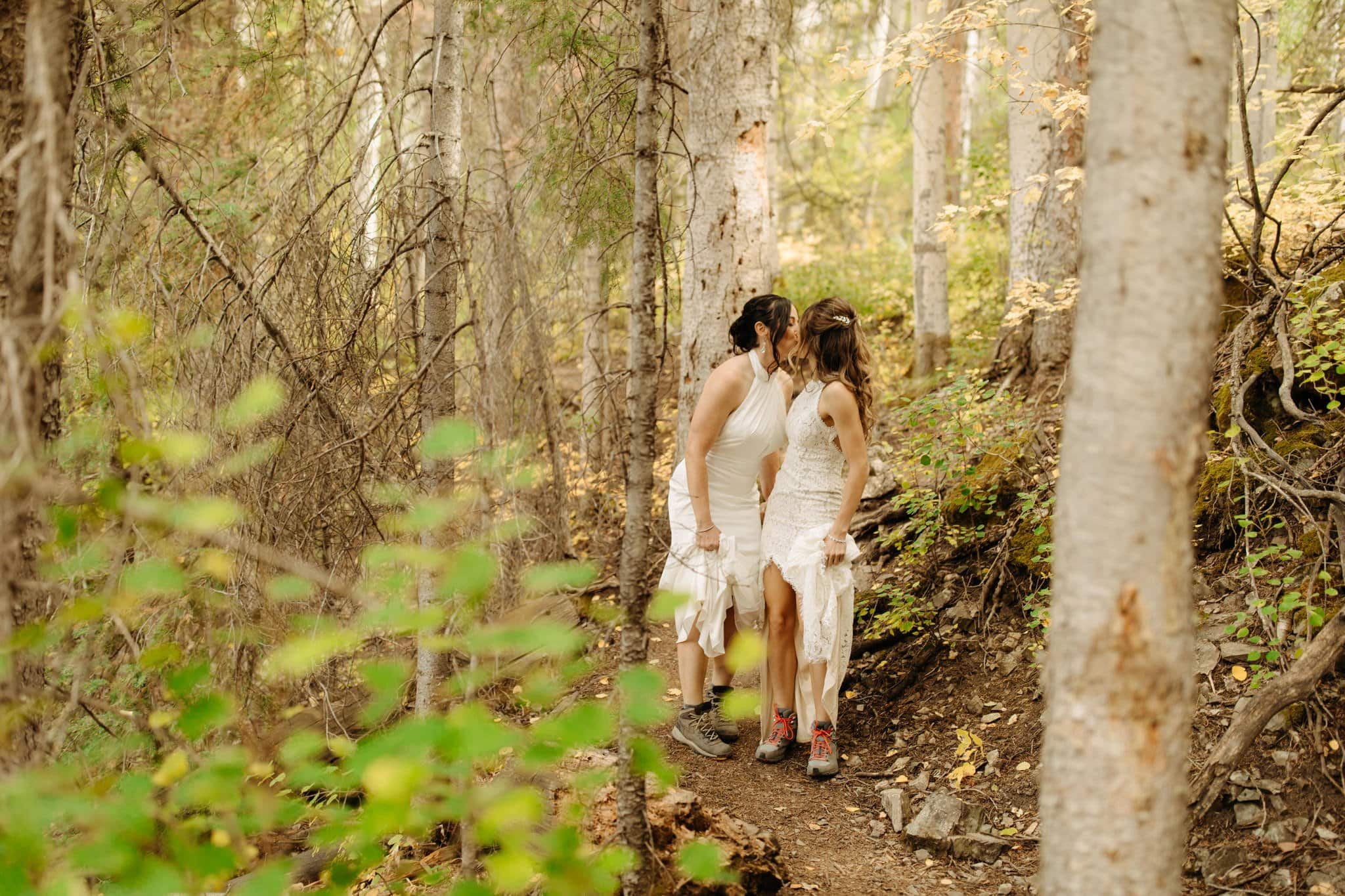 same sex hiking elopement to waterfall in telluride
