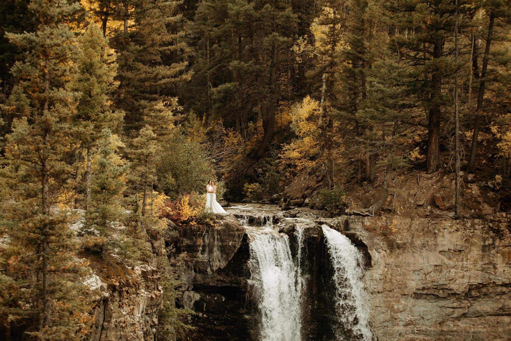 same sex hiking elopement to waterfall in telluride