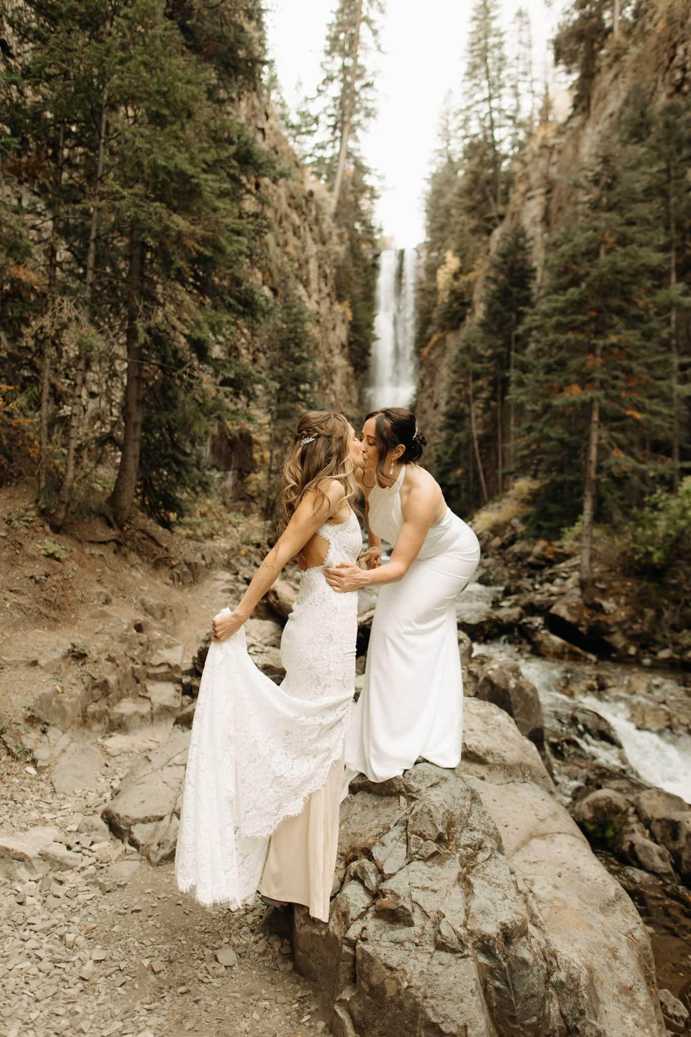 same sex hiking elopement to waterfall in telluride