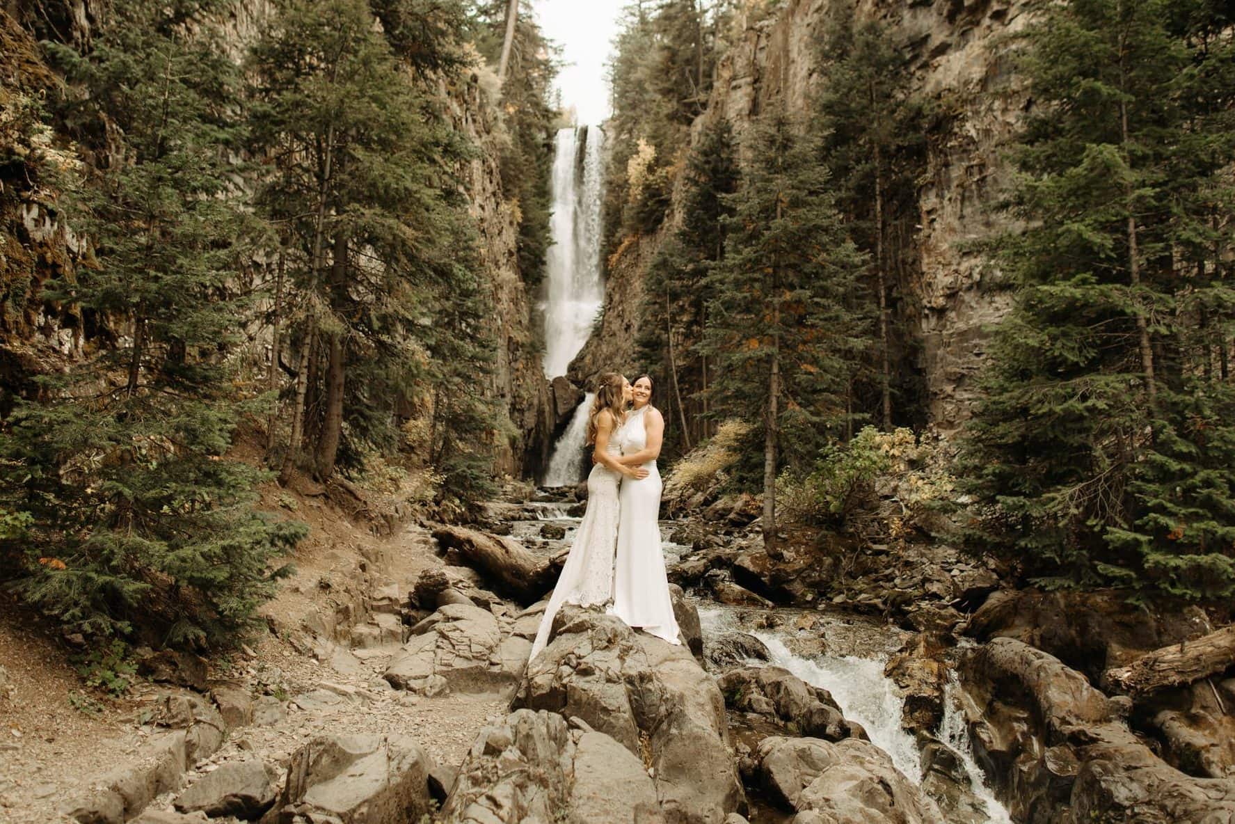 same sex hiking elopement to waterfall in telluride