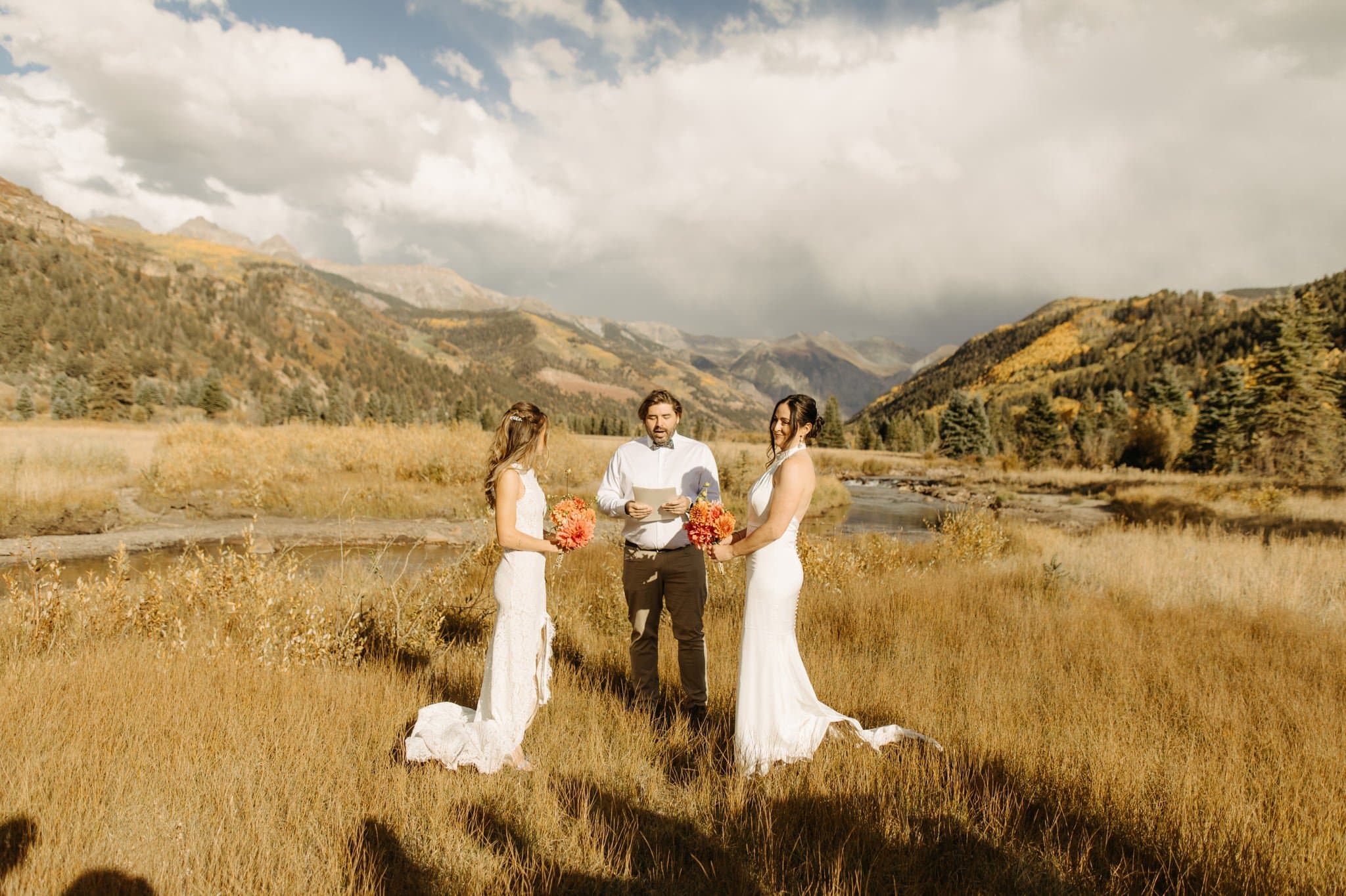 Romantic Same Sex Elopement under rainbow in Telluride