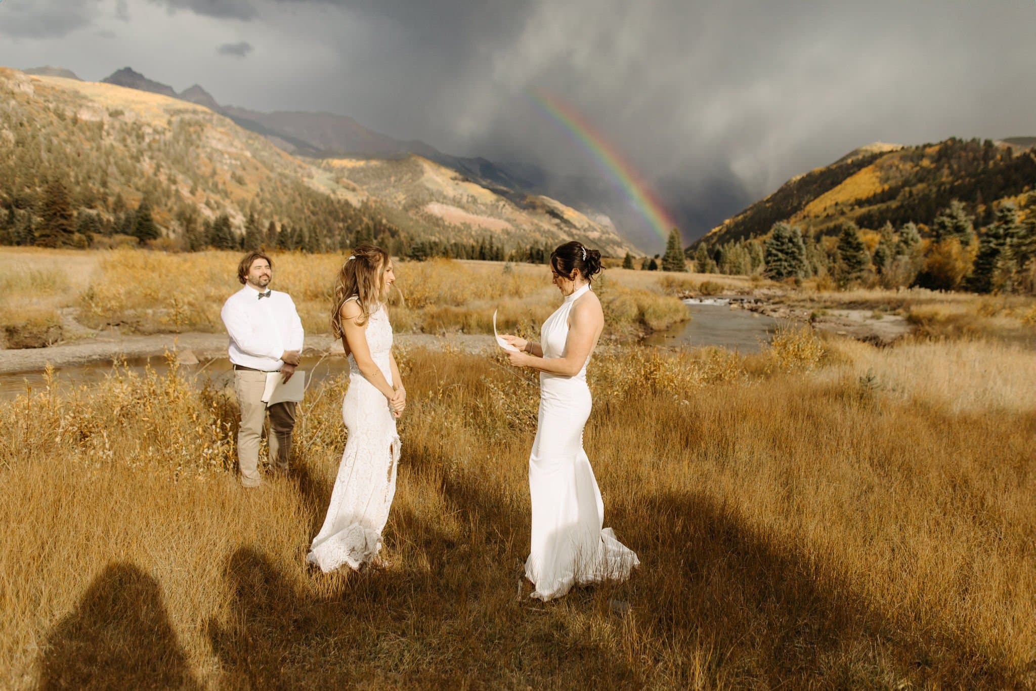 Romantic Same Sex Elopement under rainbow in Telluride