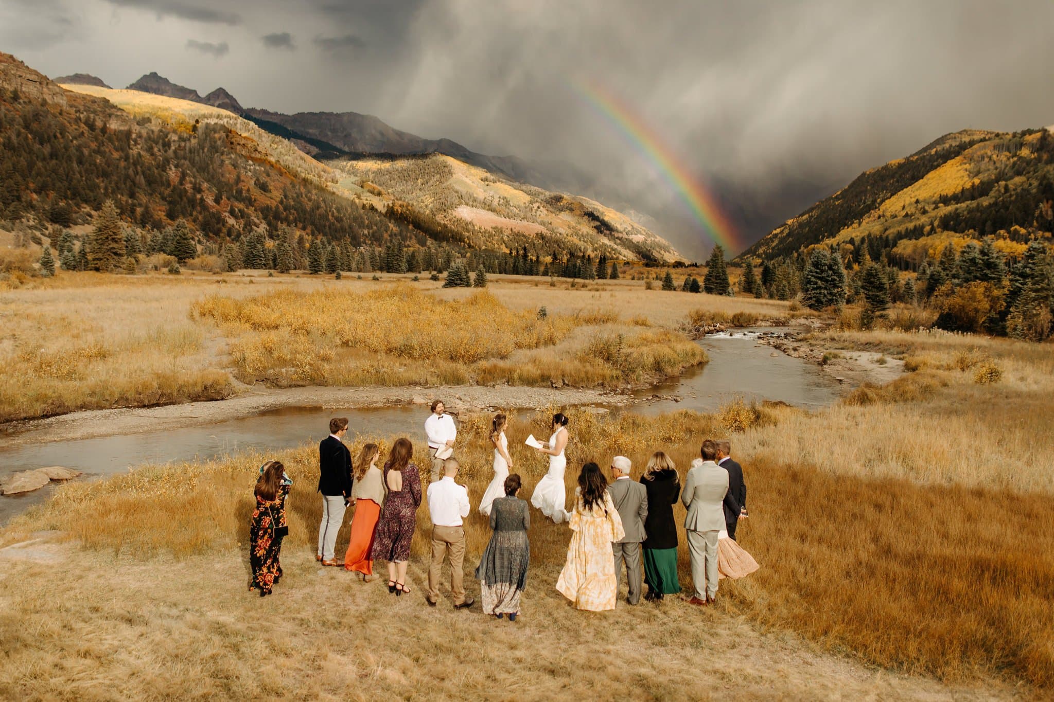 Romantic Same Sex Elopement under rainbow in Telluride