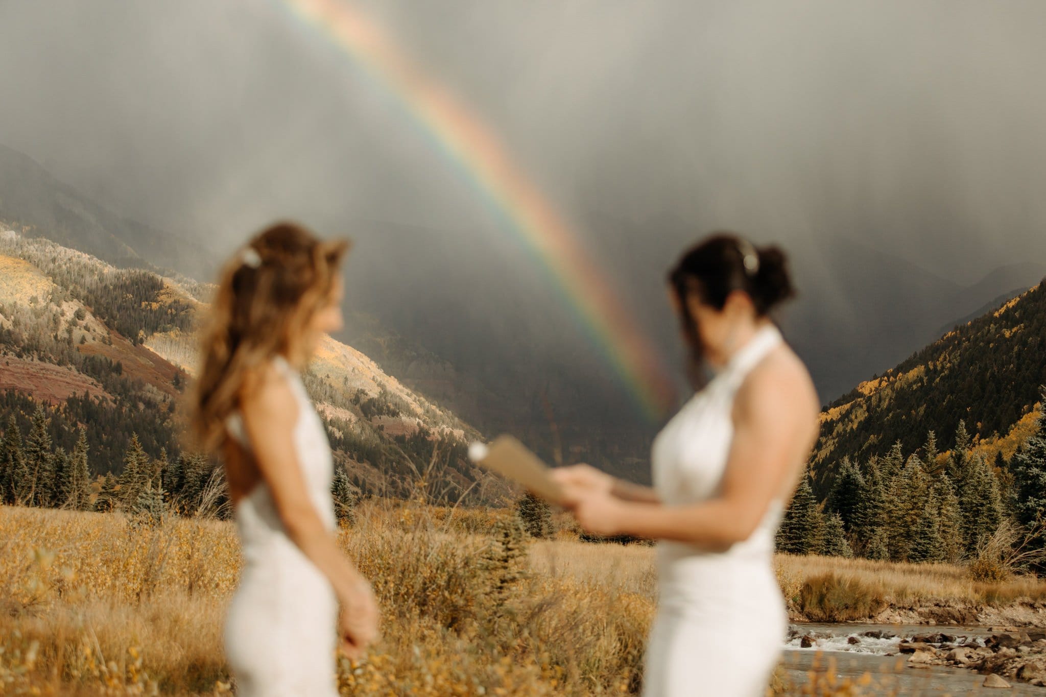 Romantic Same Sex Elopement under rainbow in Telluride