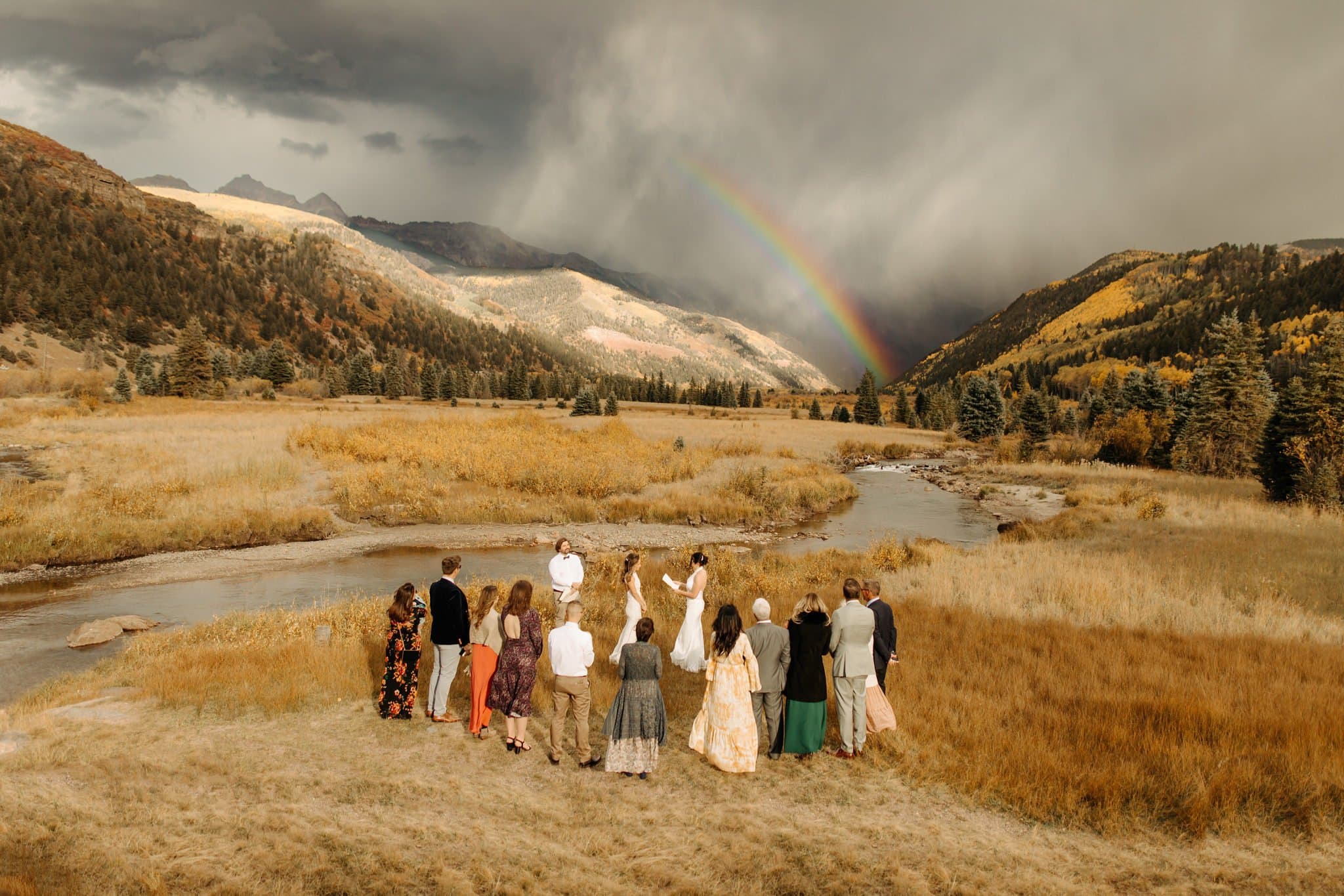 Romantic Same Sex Elopement under rainbow in Telluride