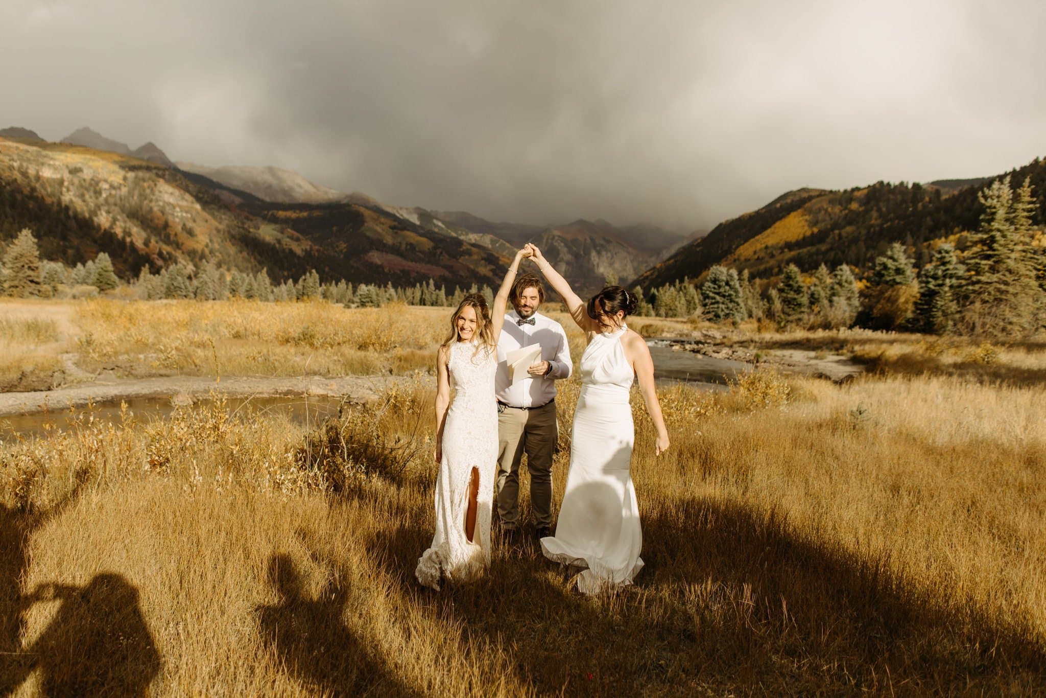 Romantic Same Sex Elopement under rainbow in Telluride
