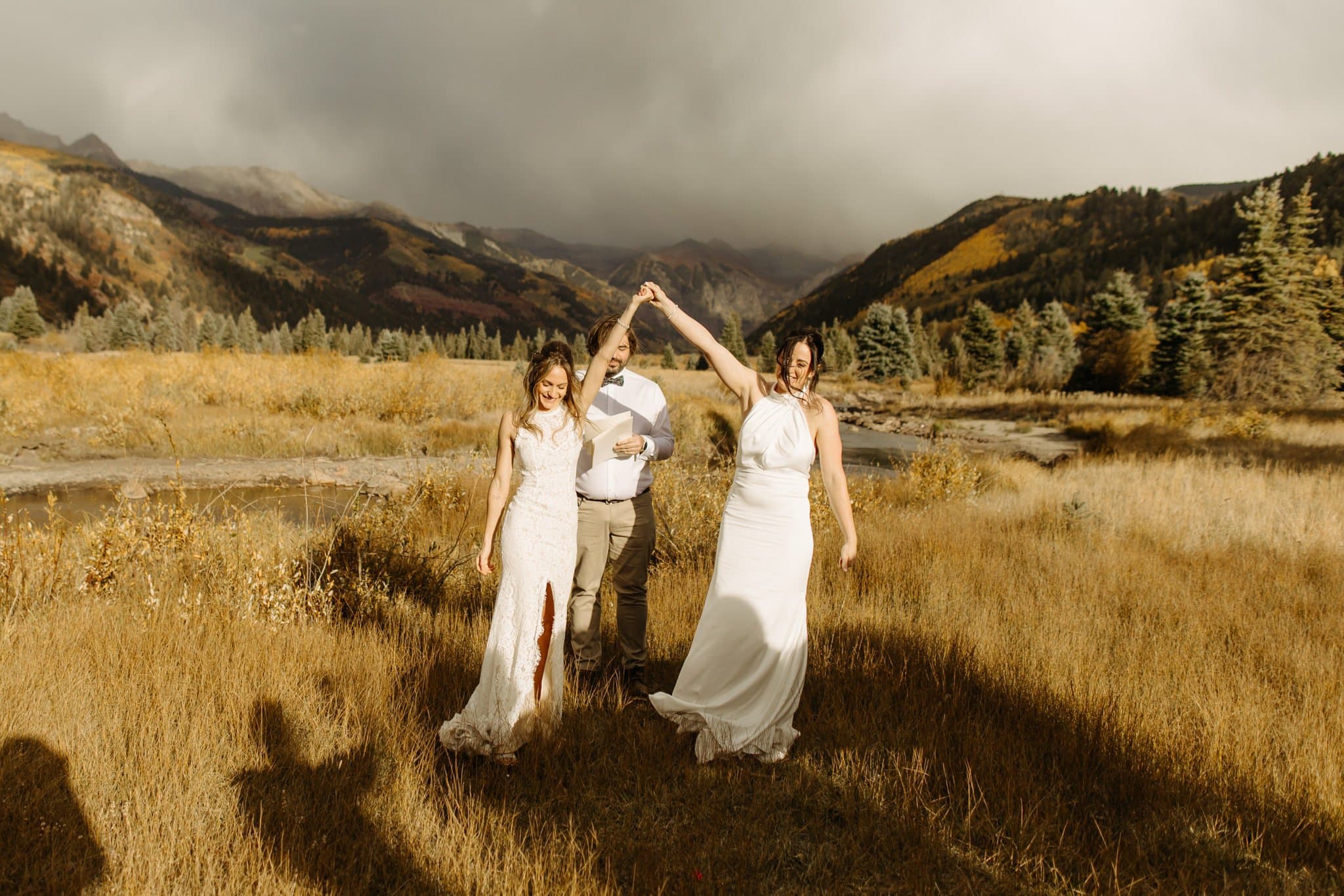 Romantic Same Sex Elopement under rainbow in Telluride