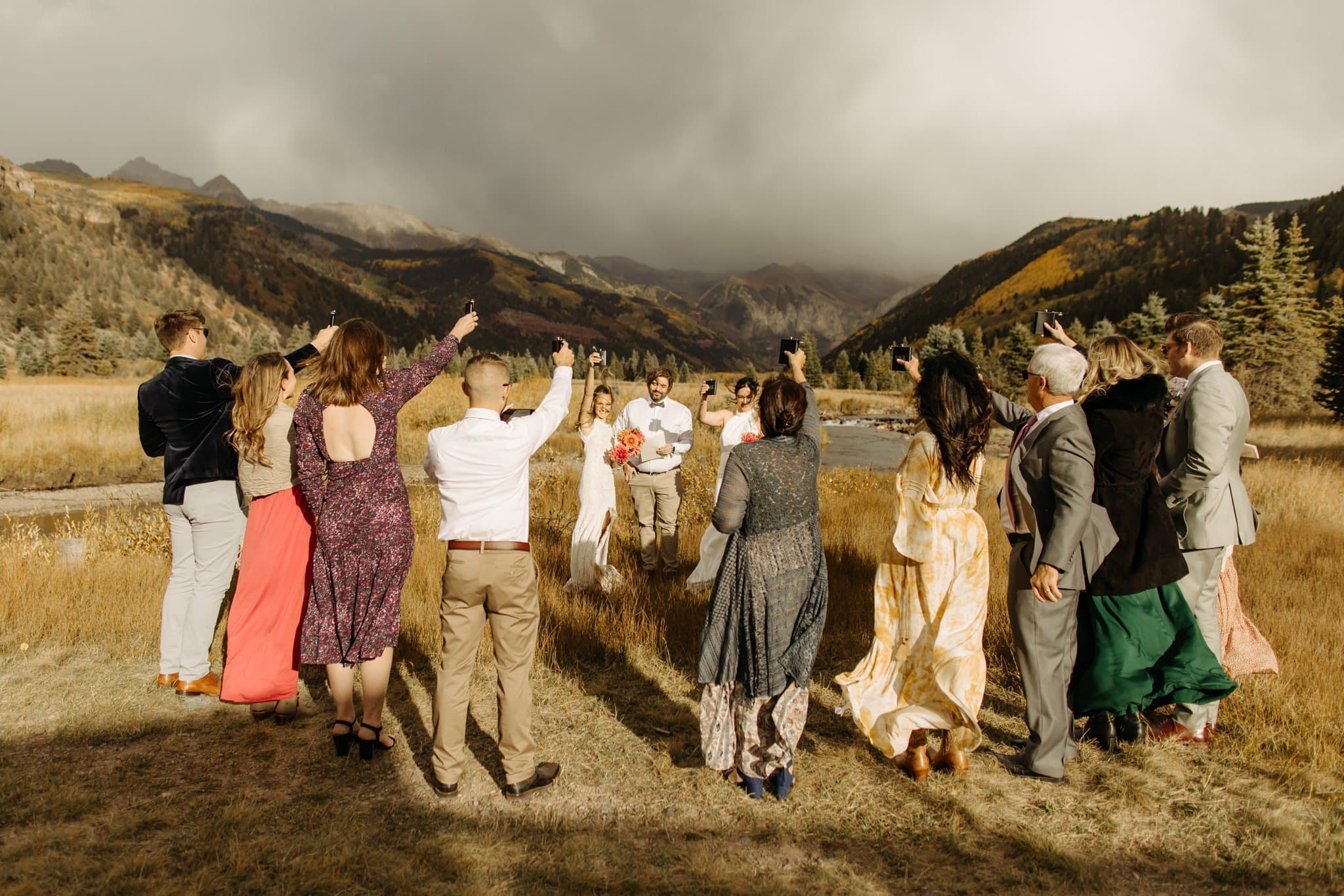 Romantic Same Sex Elopement under rainbow in Telluride