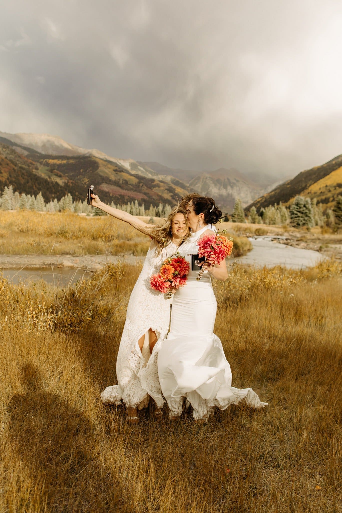 Romantic Same Sex Elopement under rainbow in Telluride