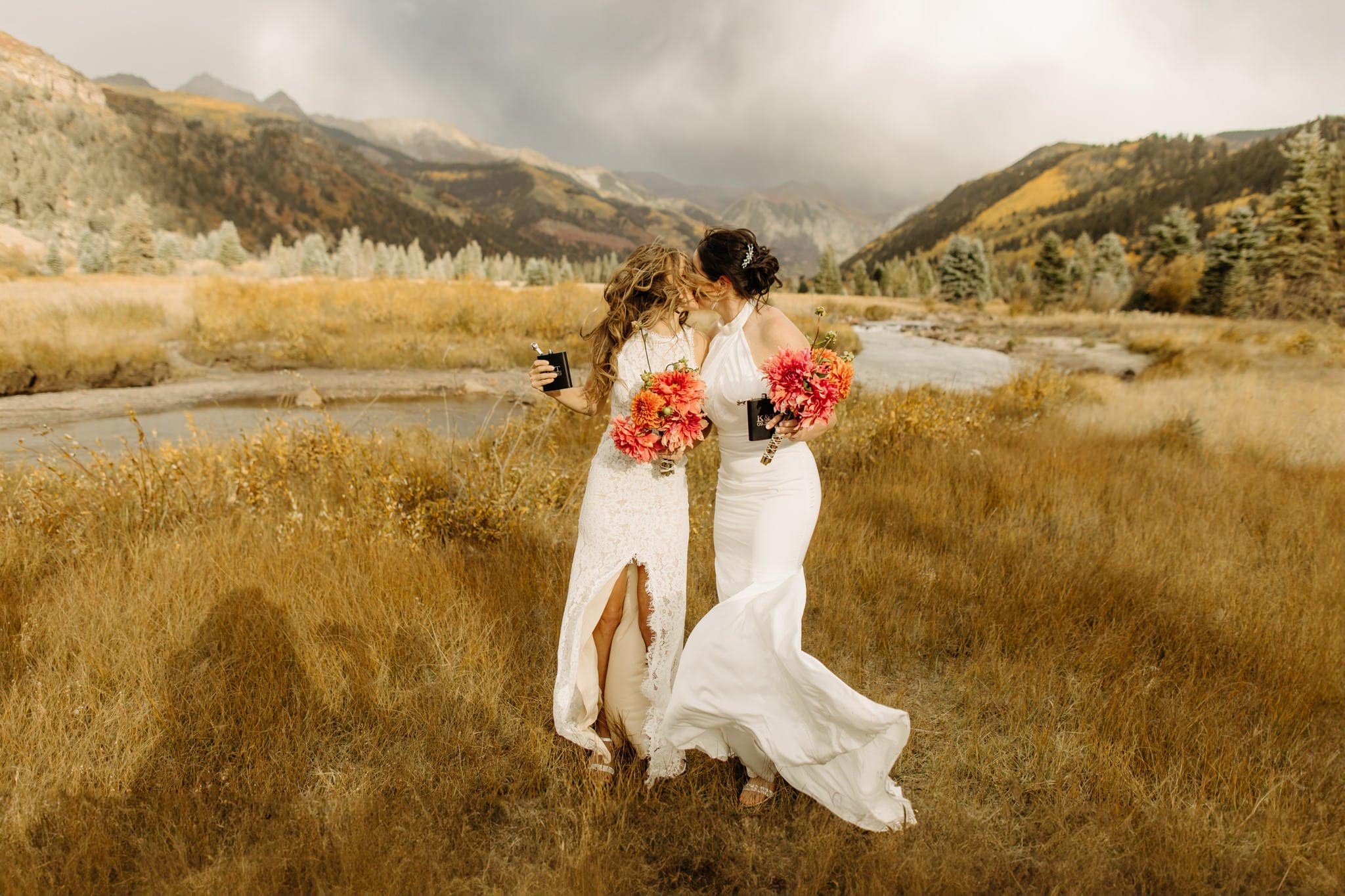 Romantic Same Sex Elopement under rainbow in Telluride