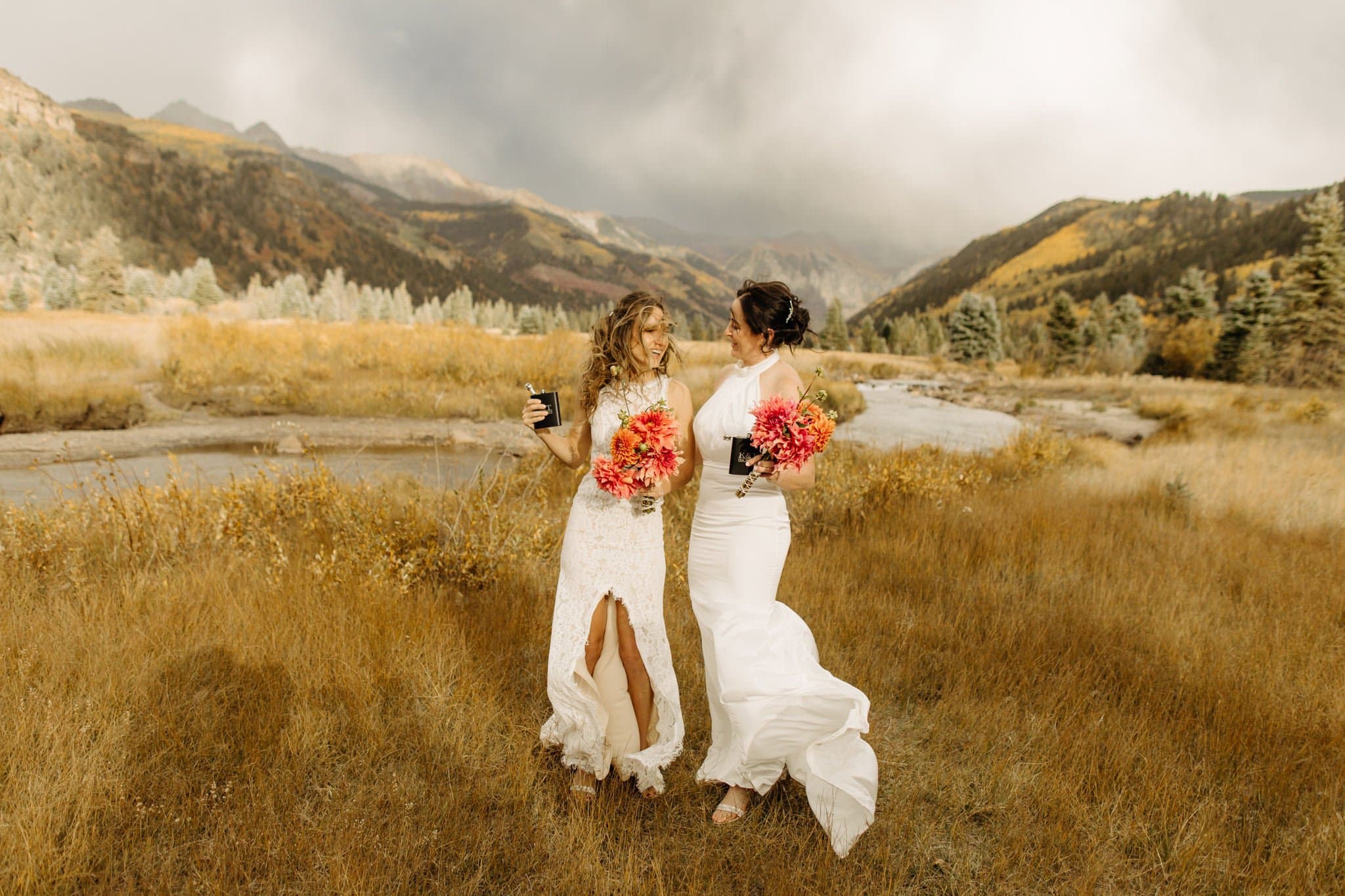 Romantic Same Sex Elopement under rainbow in Telluride