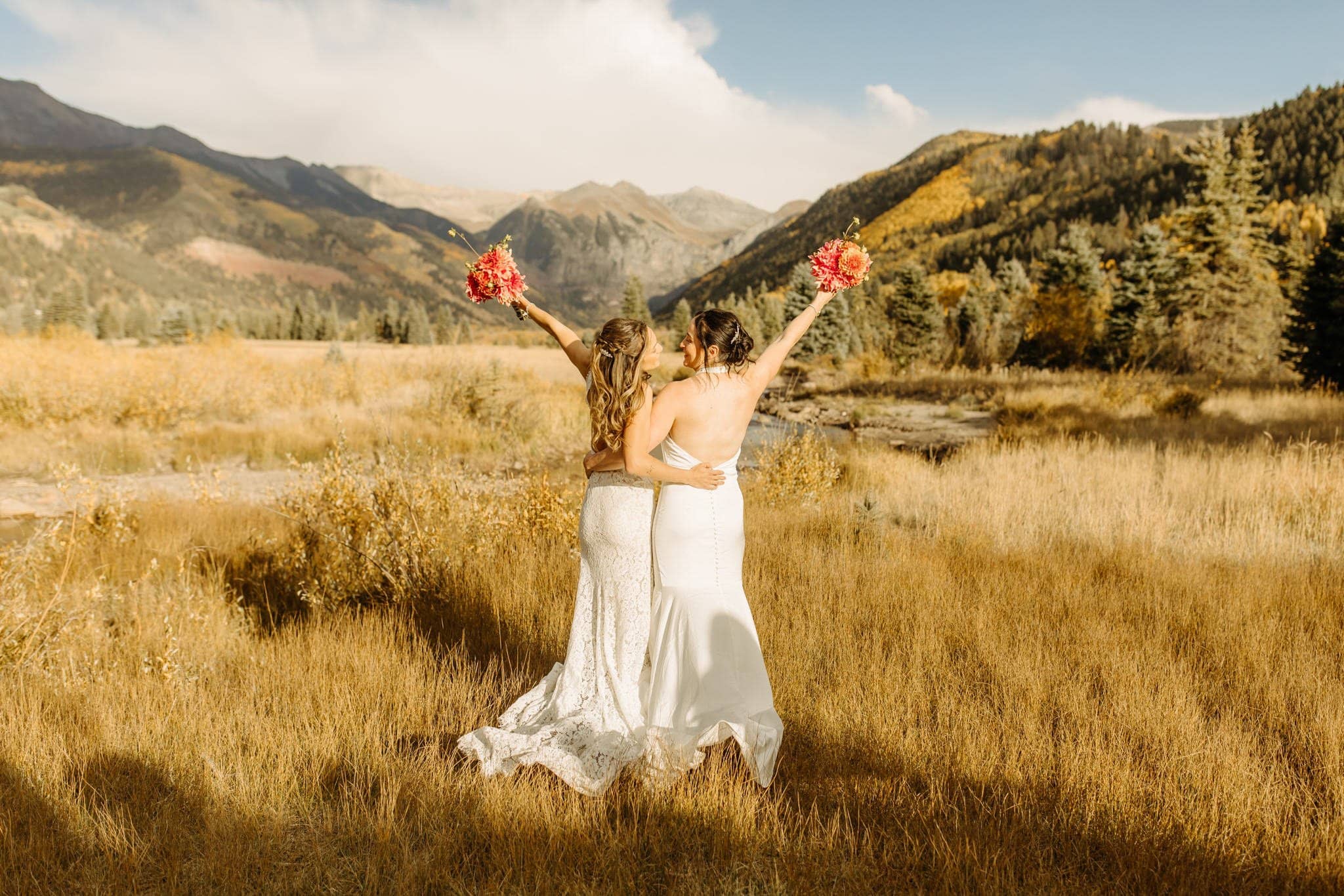 Romantic Same Sex Elopement under rainbow in Telluride