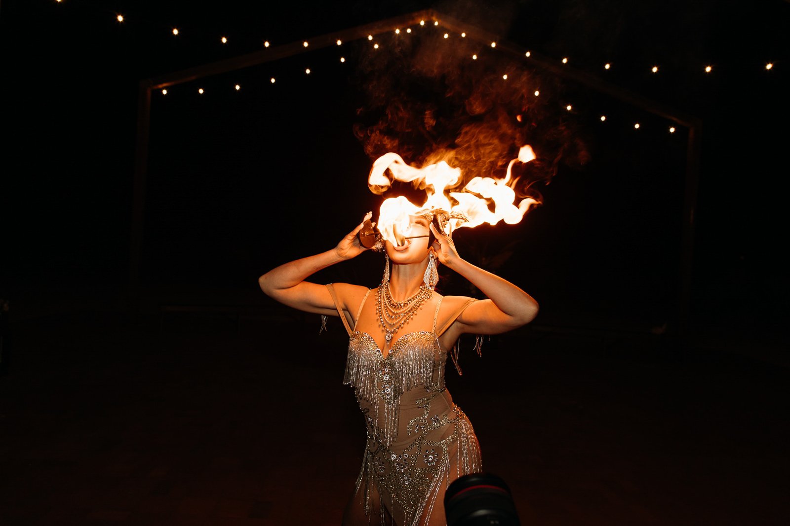Fire dancers performing at a wedding at Red Earth Venue
