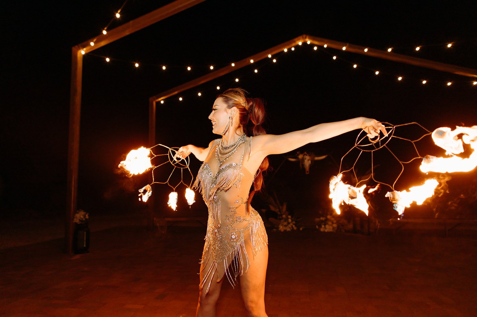 Fire dancers performing at a wedding at Red Earth Venue