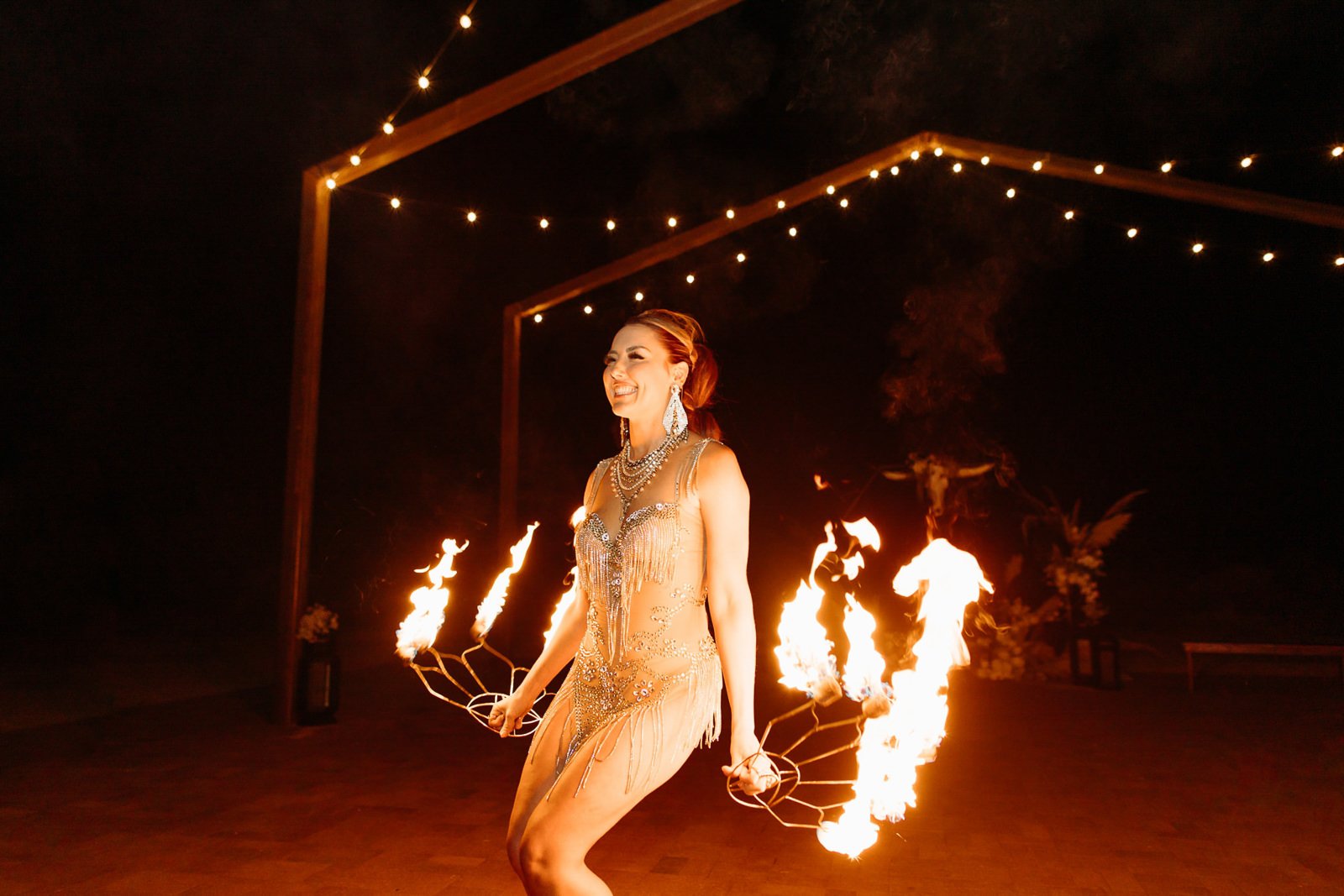 Fire dancers performing at a wedding at Red Earth Venue